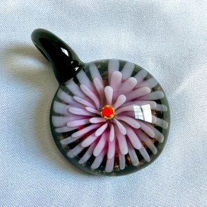 Handcrafted Lampwork Glass Pendant. Round. Pale Purple Flower.
